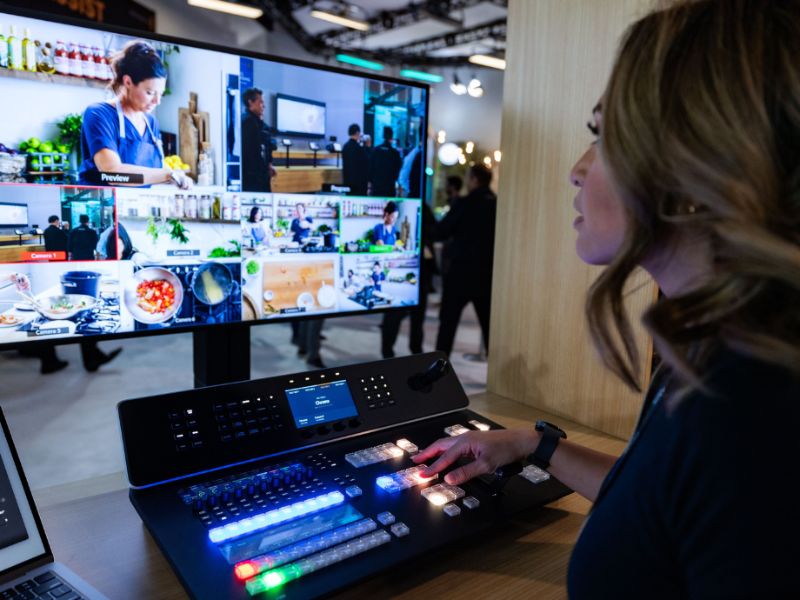 Image of a women working in post-production, likely video editing.