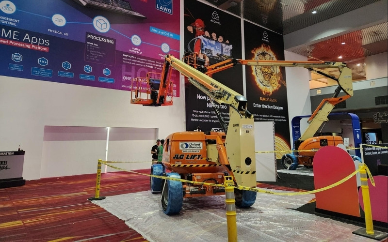 Image of a crane on the show floor. 