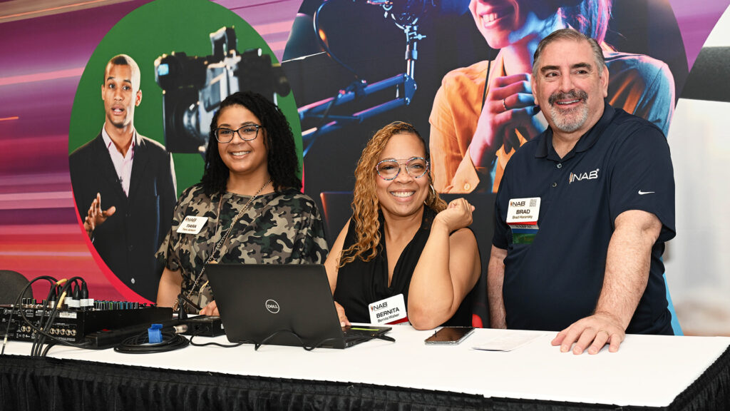 NAB staff members welcome NAB members at NAB Show. 