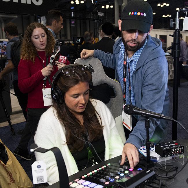 Attendee with hands-on demo at NAB Show New York