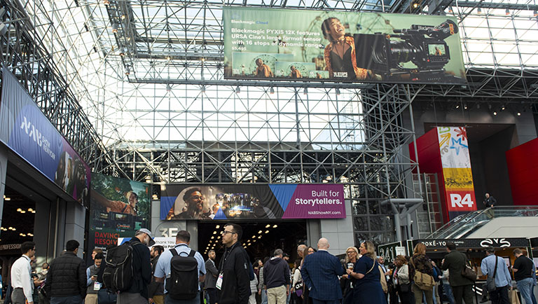 Sponsor banners in the Javits Center lobby at NAB Show New York